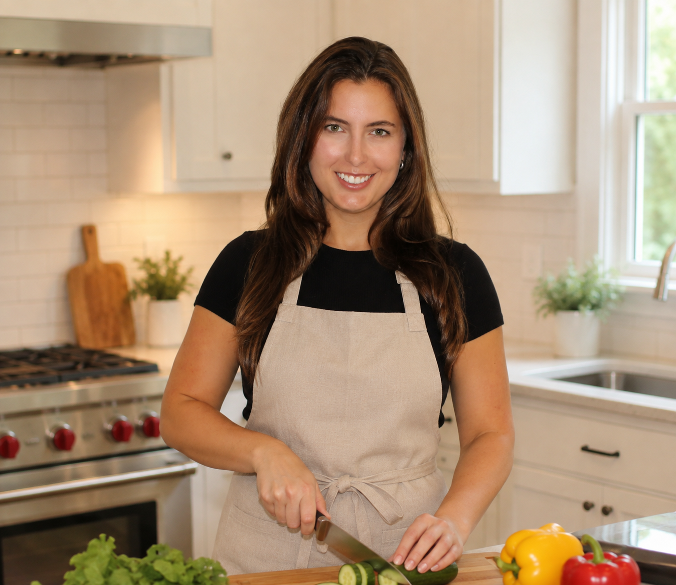 Hope chopping herbs in her kitchen